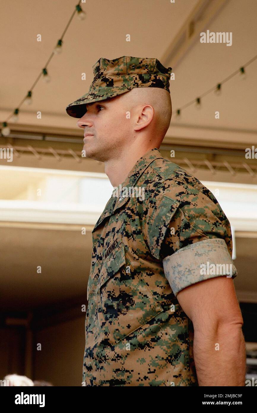 U.S. Marine Corps Lt. Col. Tim Kuhn, the associate labor and employment law  counsel for the Civilian Employment Law, Western Area Counsel Office,  Marine Corps Base Camp Pendleton, stands at attention during