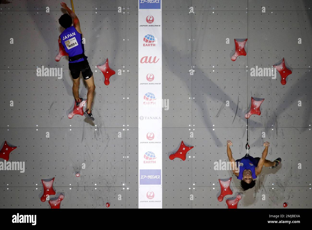Kai Harada, right, of Japan, celebrates after defeating Kokoro Fujii