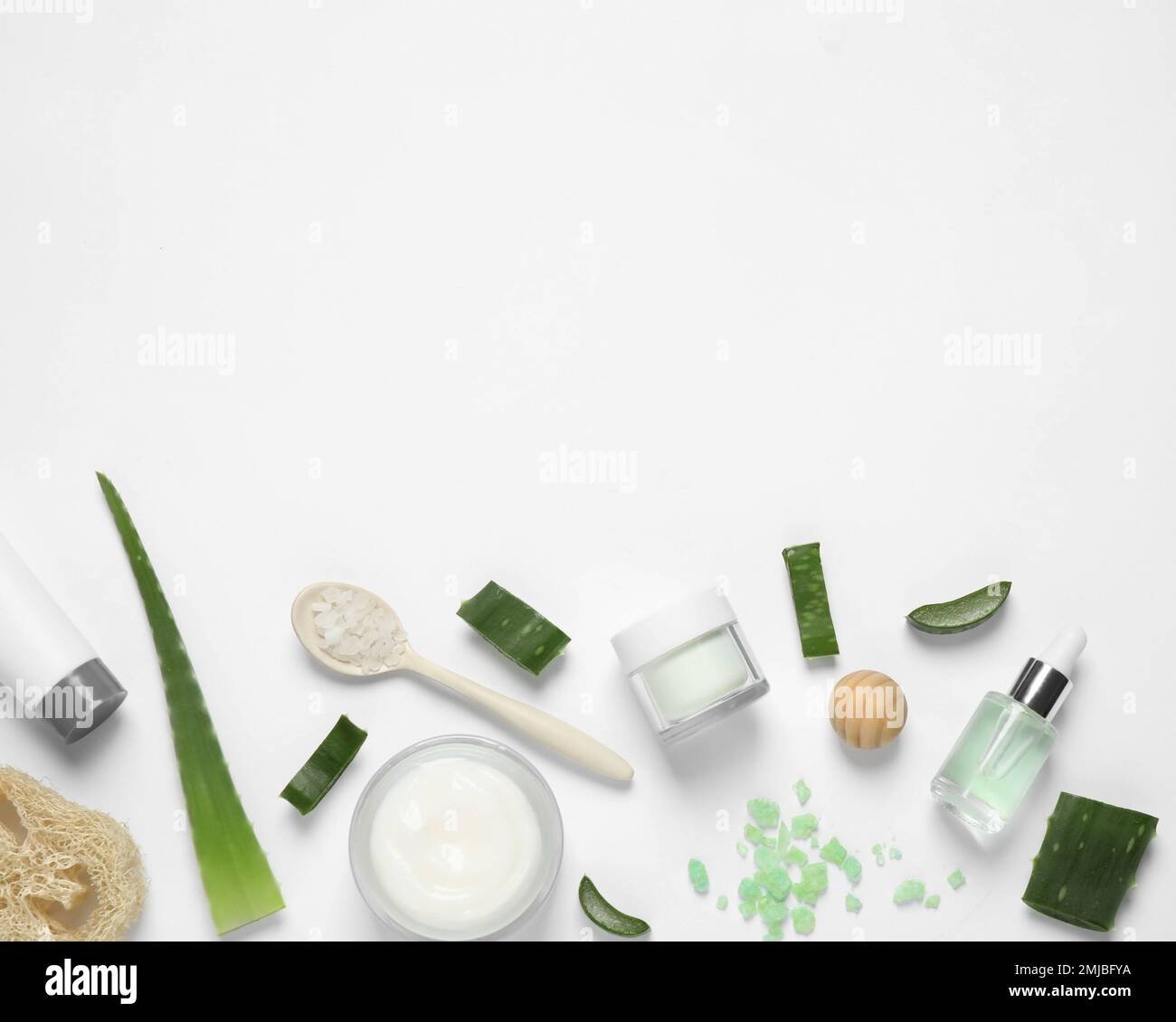 Flat lay composition with aloe vera and cosmetic products on white ...