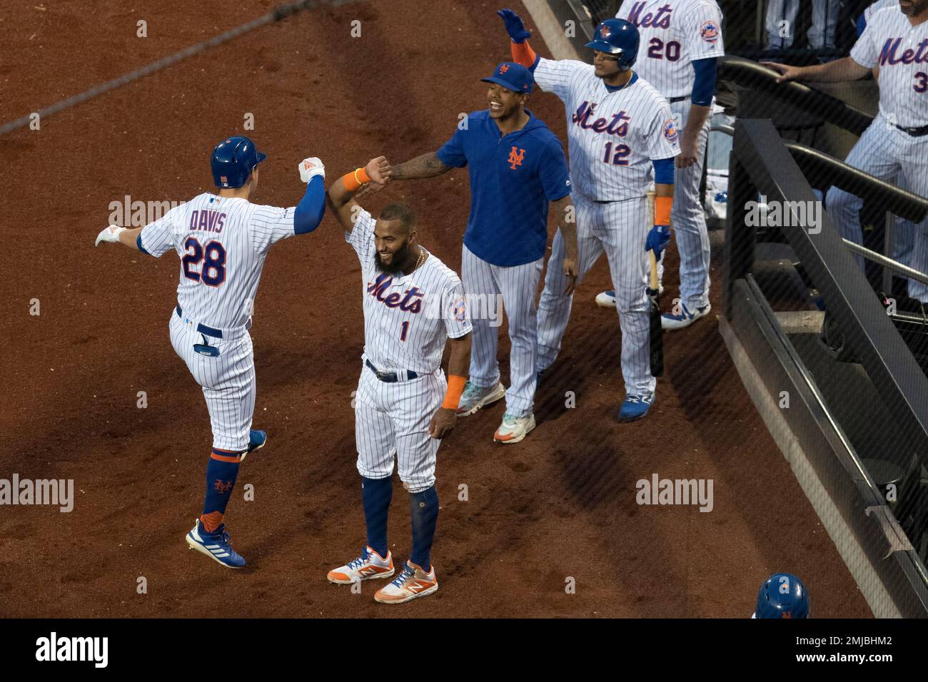 New York Mets' J.D. Davis (28) celebrates hitting a home run against the  Cleveland Indians during