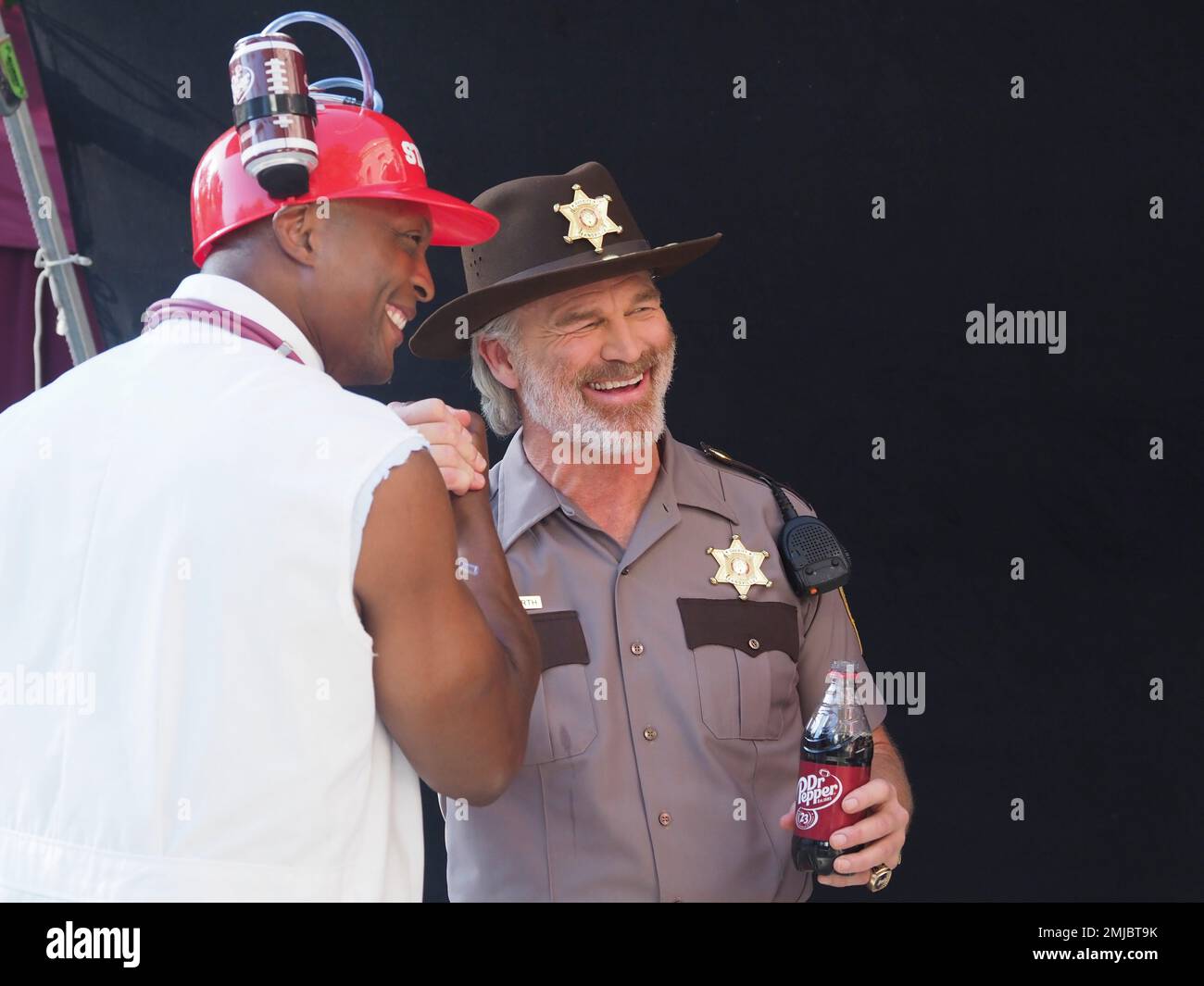 IMAGE DISTRIBUTED FOR FOR DR PEPPER College football legends Brian