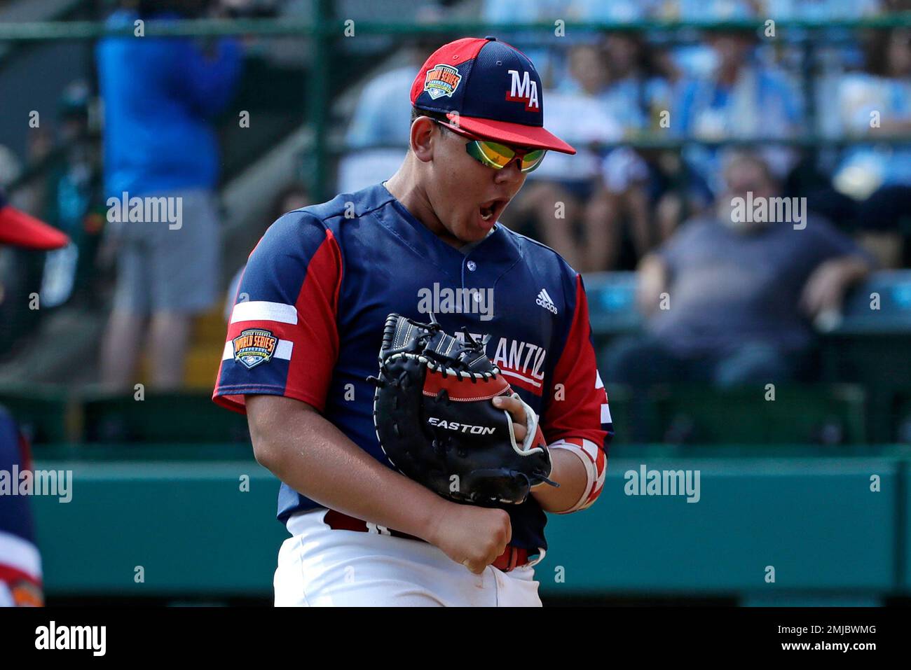 Elizabeth, New Jersey's Yadi Mateo celebrates getting the final out of the  second inning of a baseball game against Wailuku, Hawaii at the Little  League World Series tournament in South Williamsport, Pa.