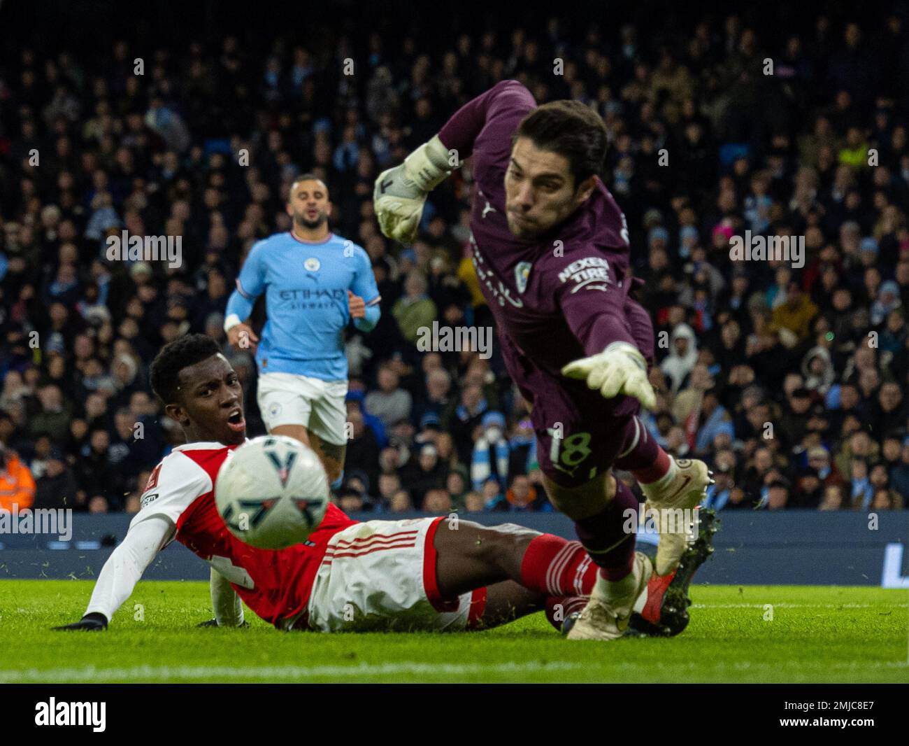 Manchester, UK. 28th Jan, 2023. Arsenal's Eddie Nketiah (front L) misses a chance during the FA Cup fourth round match between Manchester City and Arsenal in Manchester, Britain, Jan. 27, 2023. Credit: Xinhua/Alamy Live News Stock Photo