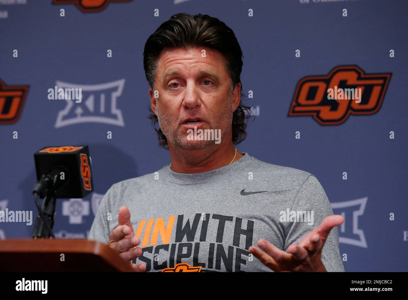 Oklahoma State Head Coach Mike Gundy During An NCAA College Football ...