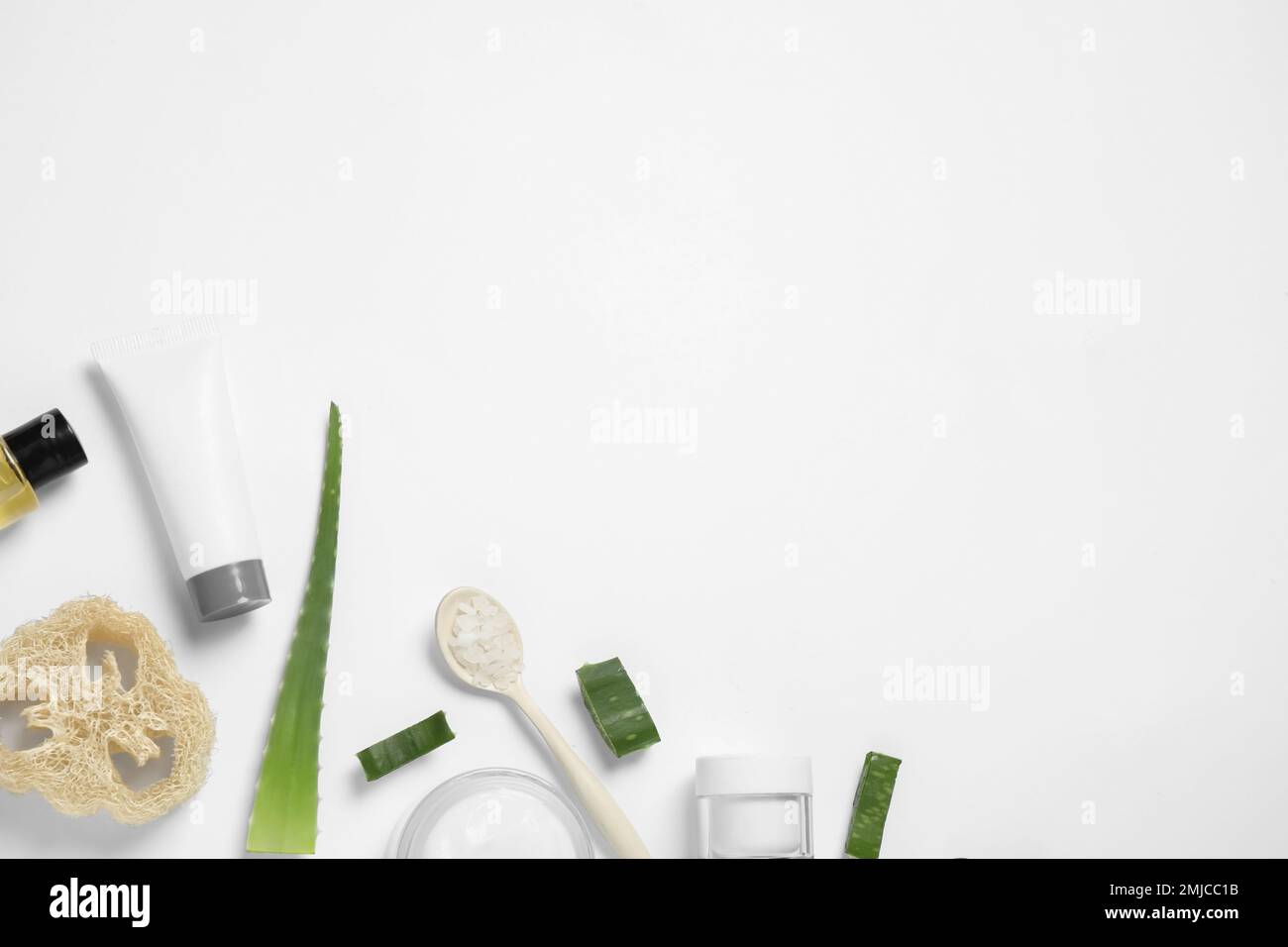 Flat lay composition with aloe vera and cosmetic products on white ...