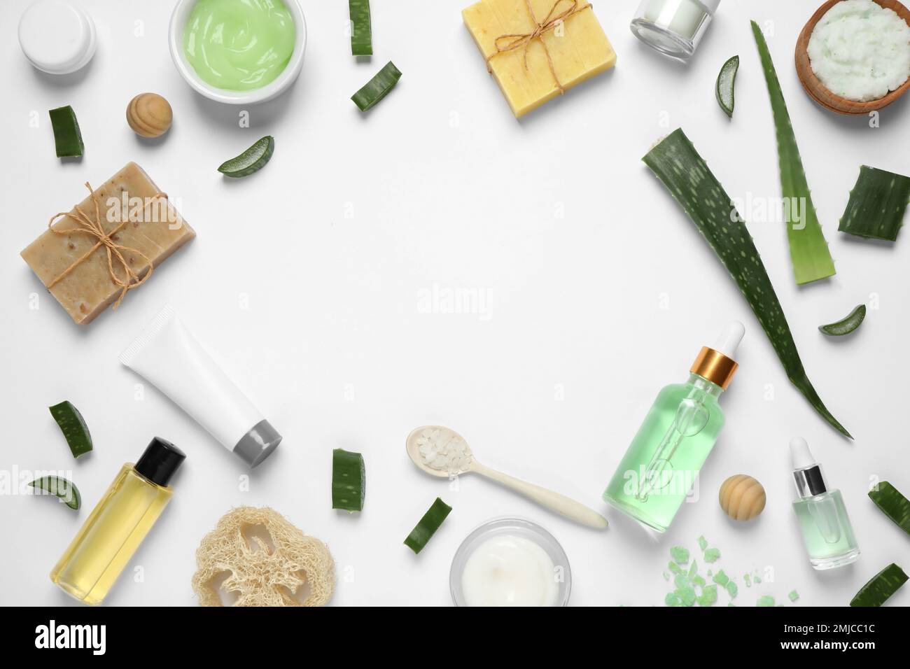 Flat lay composition with aloe vera and cosmetic products on white ...