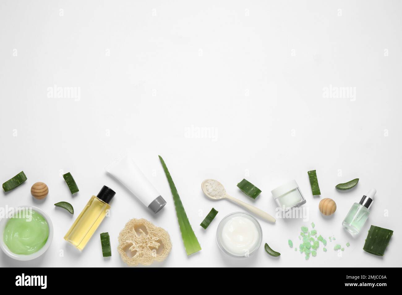 Flat lay composition with aloe vera and cosmetic products on white ...