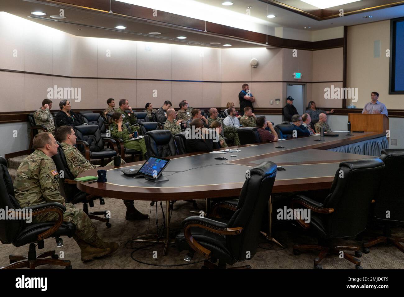 Personnel from Alaskan North American Aerospace Defense Command Region and Alaskan Command participate in a natural-disaster emergency preparation briefing provided by the Alaska Division of Homeland Security and Emergency Management at the Alaskan North American Aerospace Defense Command Region, Alaskan Command and 11th Air Force combined headquarters on Joint Base Elmendorf-Richardson, Alaska, Aug. 26, 2022. This briefing was part of a series of collaborations between Alaskan Command and federal, state, and local emergency response partners to create realistic training scenarios. Stock Photo