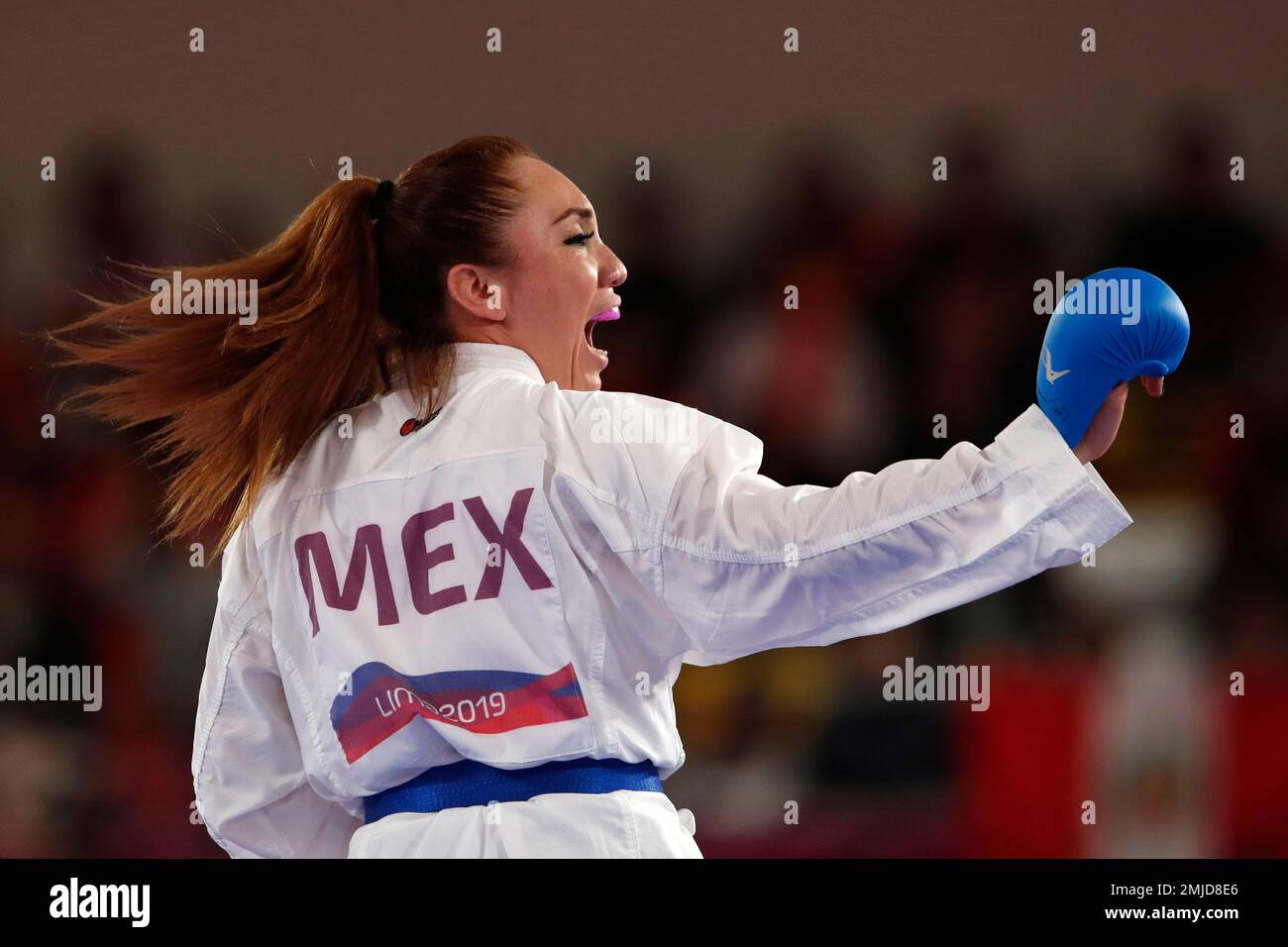 Xhunashi Caballero of Mexico yells during a women's karate under 61kg