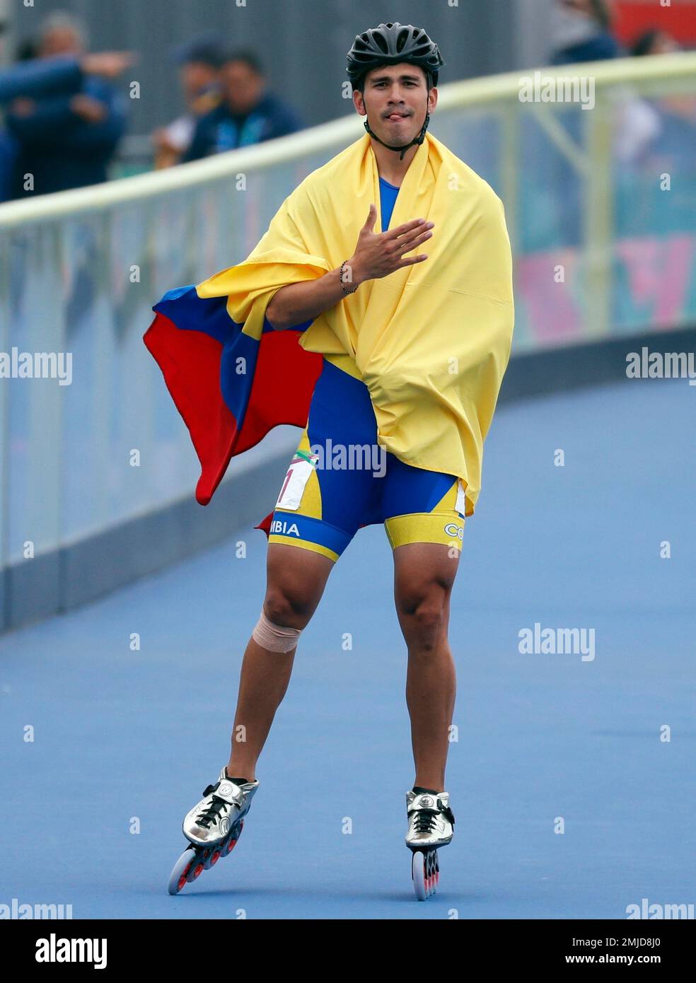 CORRECTS DATE Pedro Causil of Colombia celebrates after winning the