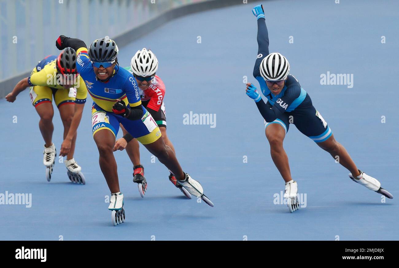 Corrects Date - Geiny Pajaro of Colombia, second left, competes winning ...