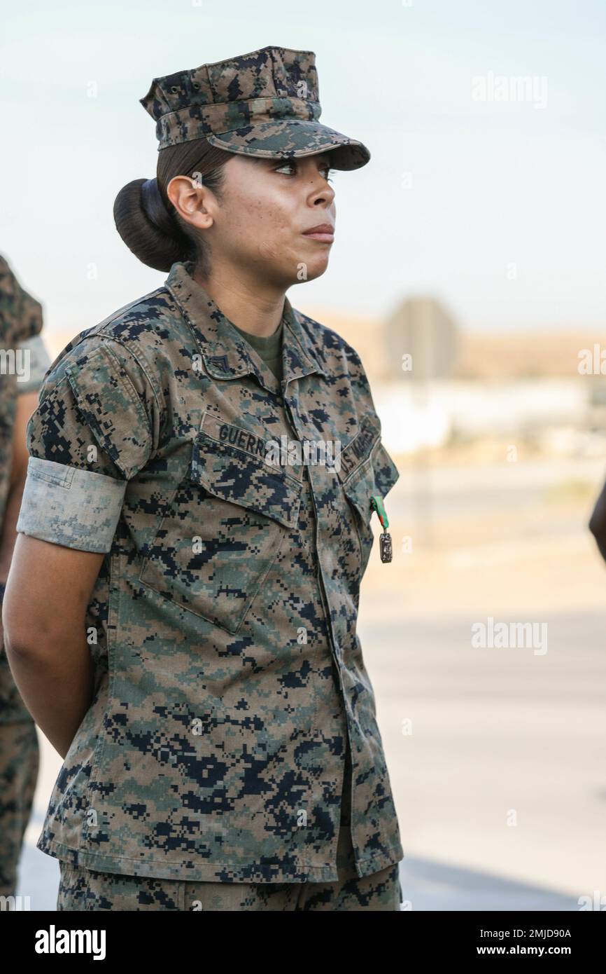 U.S. Marine Corps Cpl. Luz Guerrero, an inventory management specialist  with Combat Logistics Regiment 3, 3rd Marine Logistics Group, receives a  Navy and Marine Corps Achievement Medal during Exercise Maltese Dragon, at