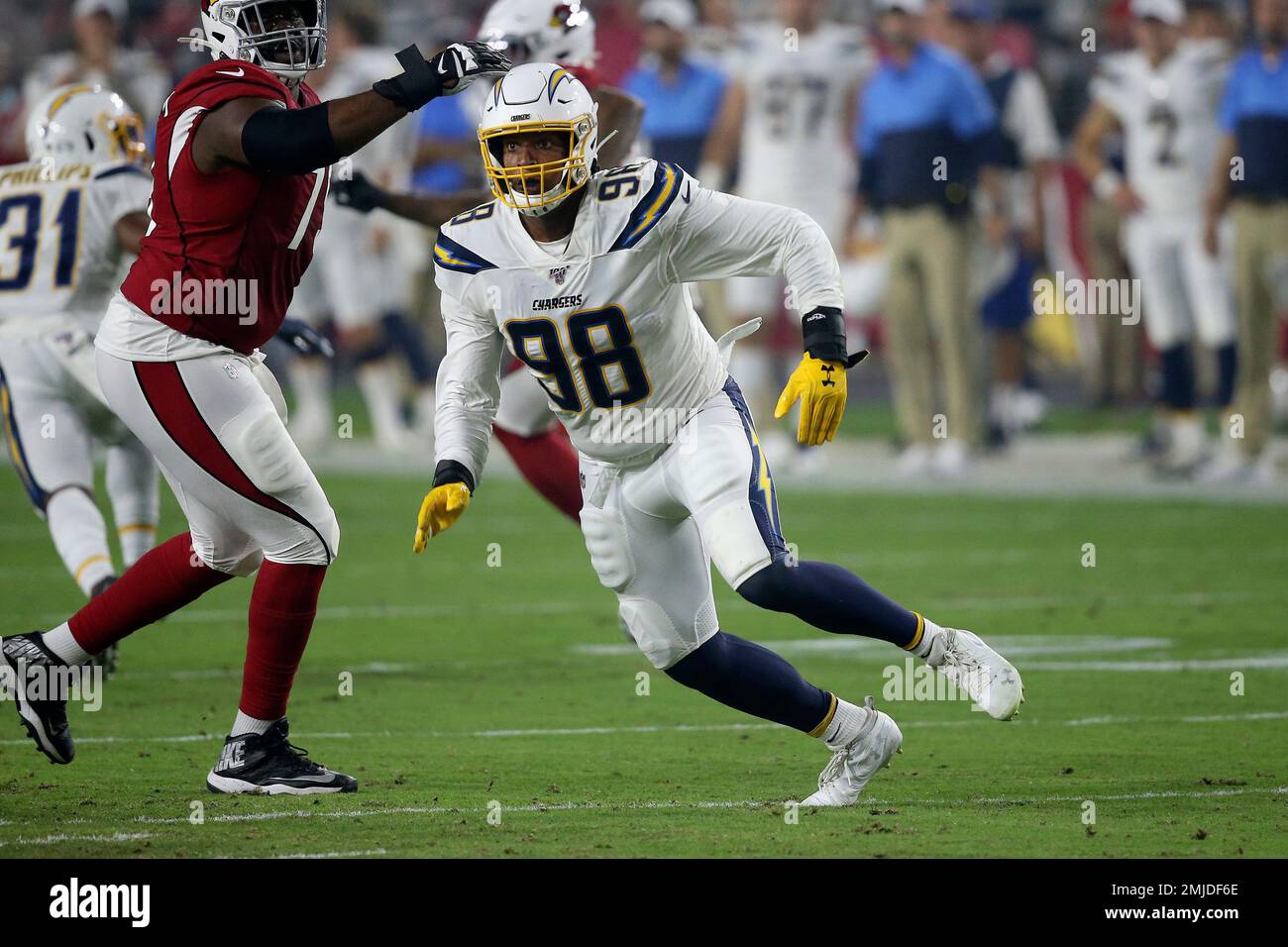 Los Angeles Chargers defensive end Isaac Rochell (98) blocks against the  Arizona Cardinals during the first half of an NFL preseason football game,  Thursday, Aug. 8, 2019, in Glendale, Ariz. (AP Photo/Ross