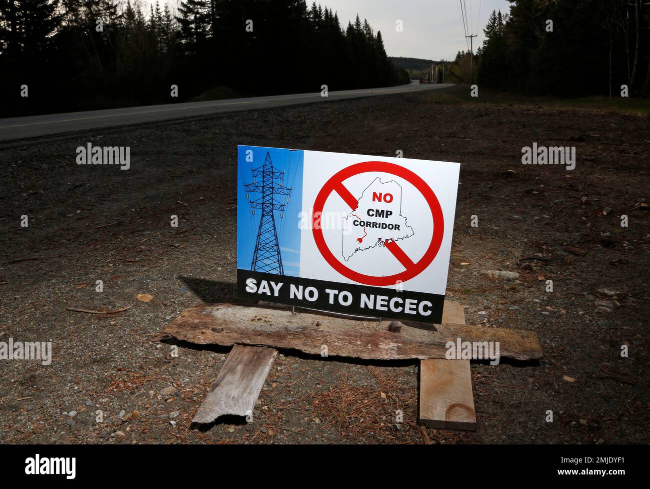 In this Tuesday, May 28, 2019 photo a sign protests Central Maine Power