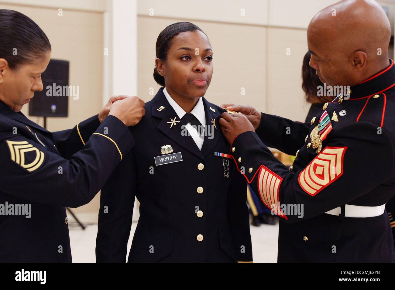 Officer Candidate Chantal Worthy, is pinned during an Officer Candidate