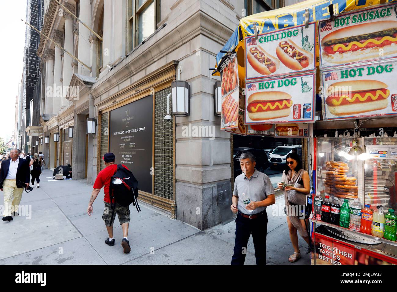 In this July 30, 2019, photo people pass the former Polo Ralph Lauren  store, on New York's Fifth Avenue. Over the last year or so, Gap, Tommy  Hilfiger, Lord & Taylor and