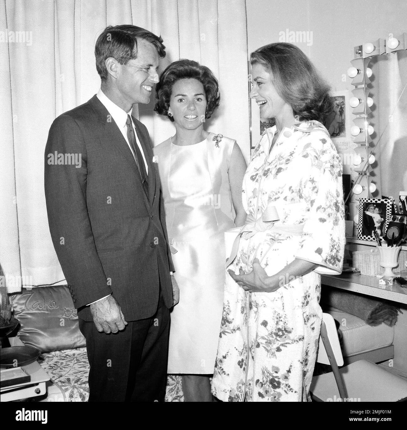 Senator Robert F. Kennedy and his wife Ethel visit with Lauren Bacall