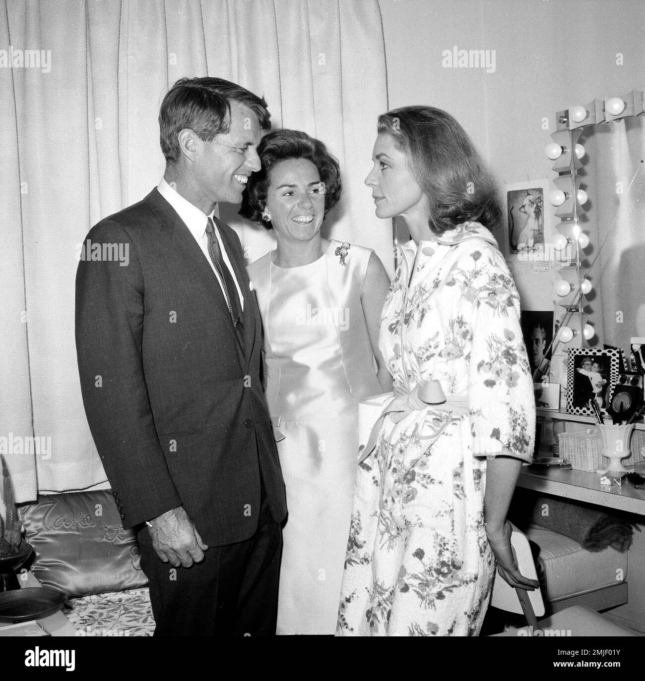 Senator Robert F. Kennedy and his wife Ethel visit with Lauren Bacall