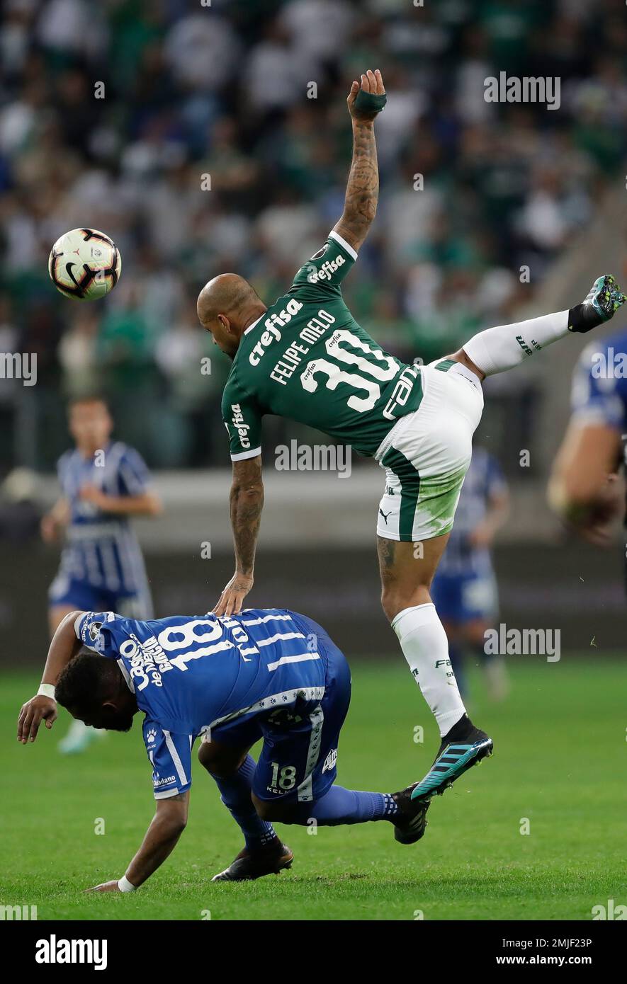 Santiago Damian Garcia Correa of Argentina's Godoy Cruz heads to score  against Paraguay's Olimpia during a Copa Libertadores soccer game in  Asuncion, Paraguay, Tuesday, April 9, 2019. (AP Photo/Jorge Saenz Stock  Photo 