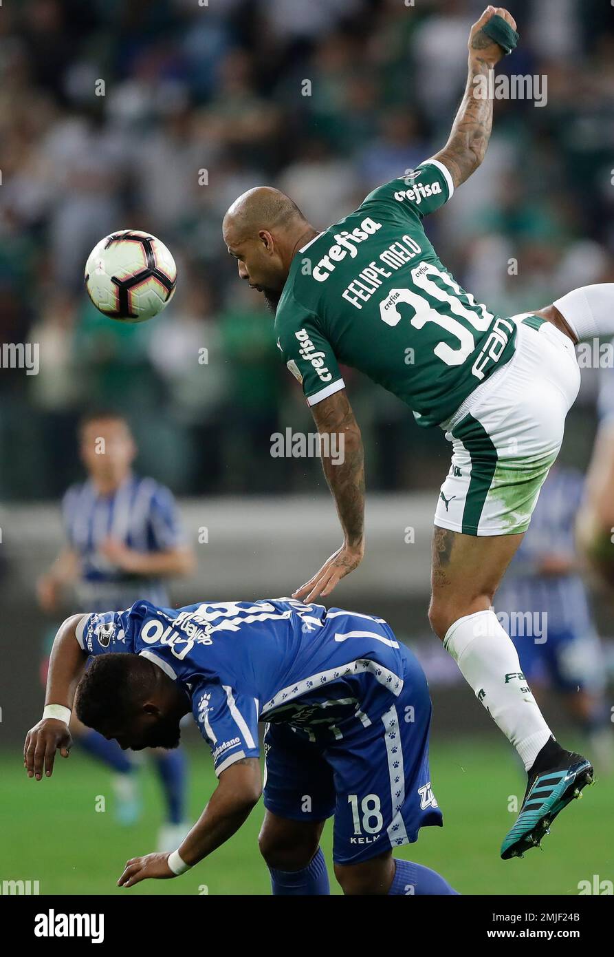 Santiago Damian Garcia Correa of Argentina's Godoy Cruz heads to score  against Paraguay's Olimpia during a Copa Libertadores soccer game in  Asuncion, Paraguay, Tuesday, April 9, 2019. (AP Photo/Jorge Saenz Stock  Photo 