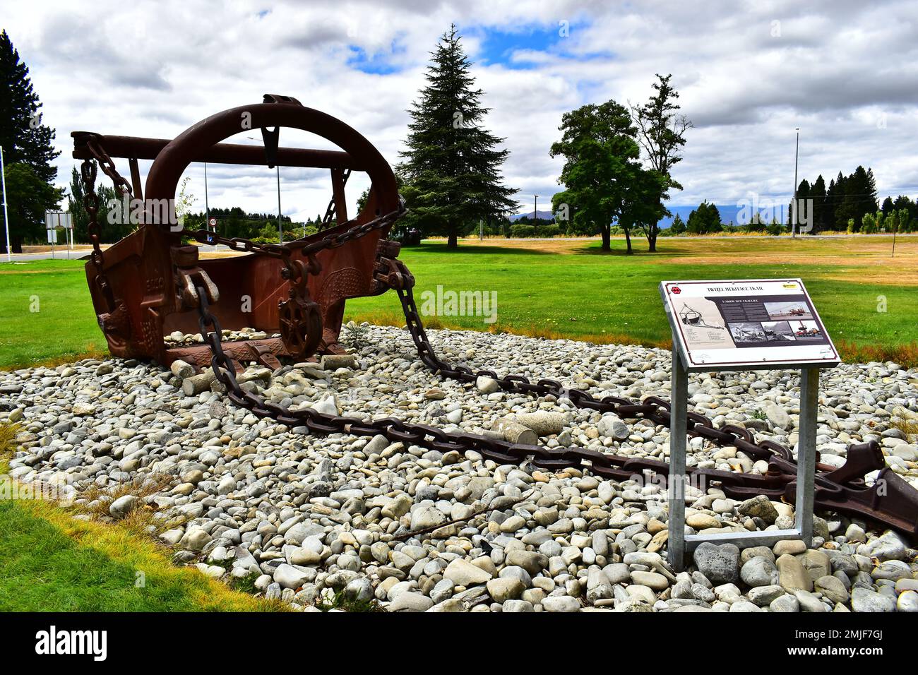 dragline bucket from a past power generation project on display at apublic park. Stock Photo