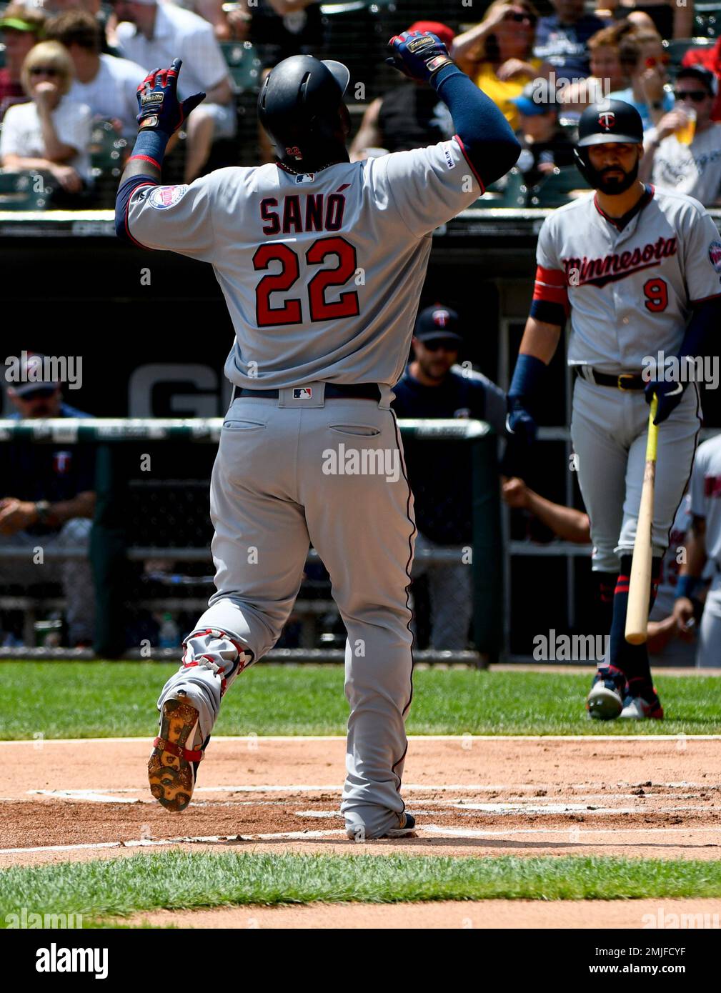 Minnesota Twins Miguel Sano (22) reacts after he hit a three-run home run  during the first inning of a baseball game against the Chicago White Sox,  Sunday, July 28, 2019, in Chicago. (