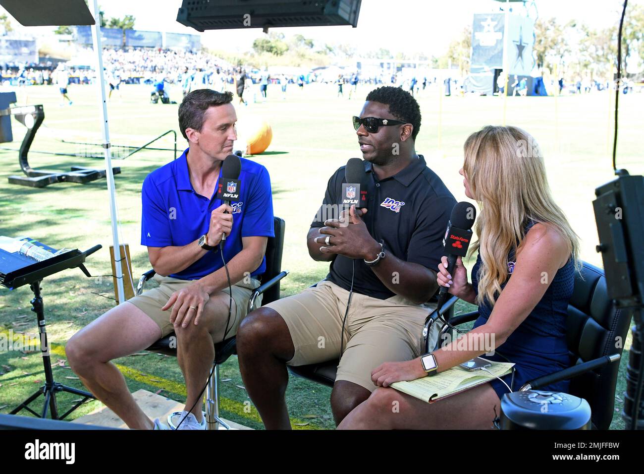 Rhett Lewis, left, LaDainian Tomlinson and Jane Slater broadcast for Inside  Training Camp Live on the NFL network from the Dallas Cowboys' training  camp in Oxnard, Calif., Saturday, July 27, 2019. (AP