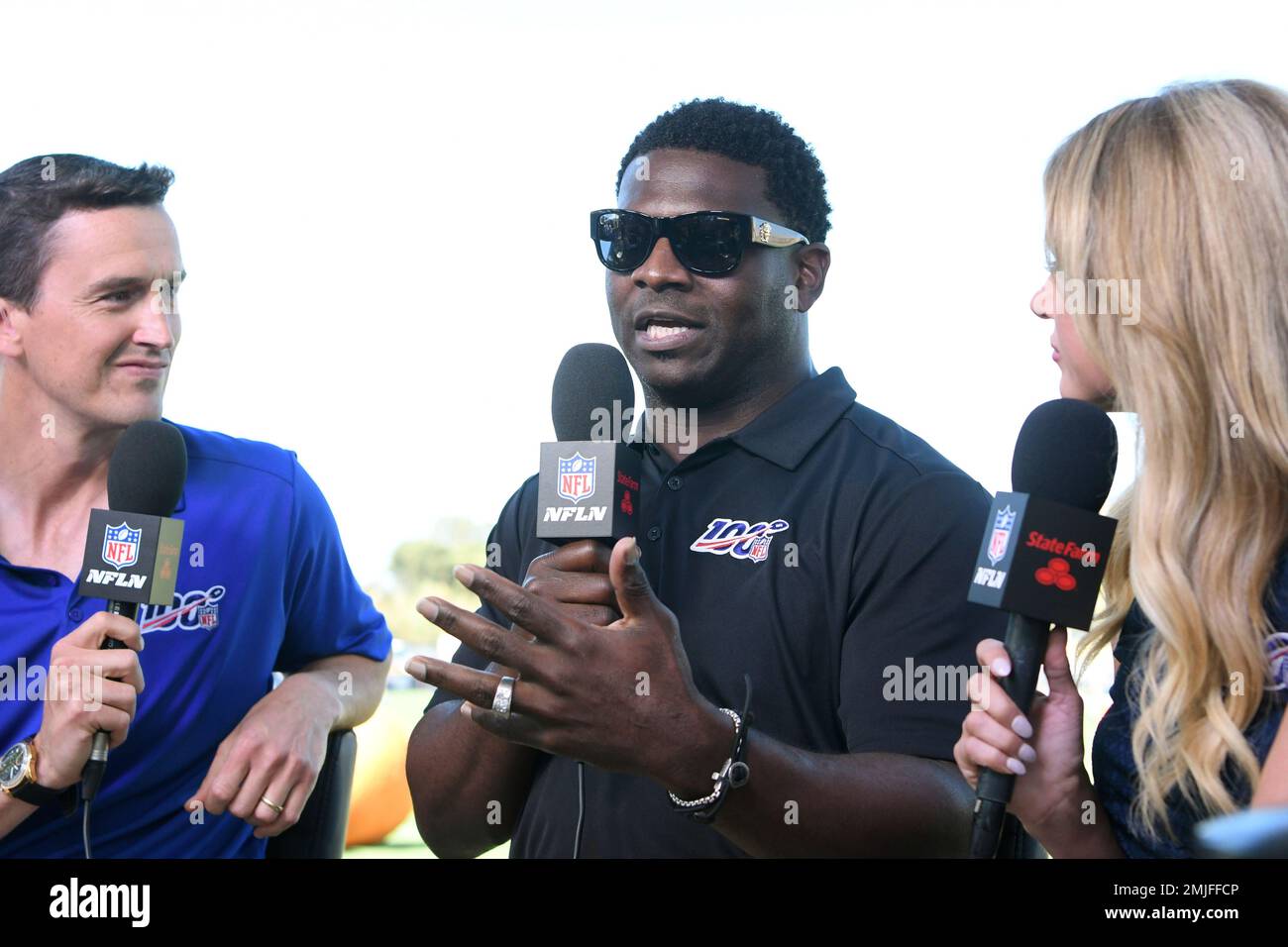 Rhett Lewis, left, LaDainian Tomlinson and Jane Slater broadcast for Inside  Training Camp Live on the NFL network from the Dallas Cowboys' training  camp in Oxnard, Calif., Saturday, July 27, 2019. (AP