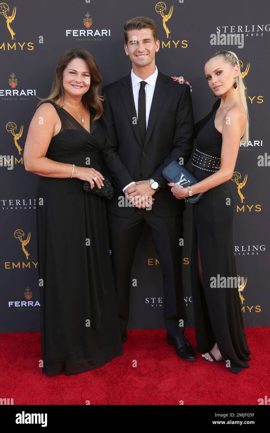 Audrey Melugin, from left, Bill Melugin, and Katy Johnson arrive at the