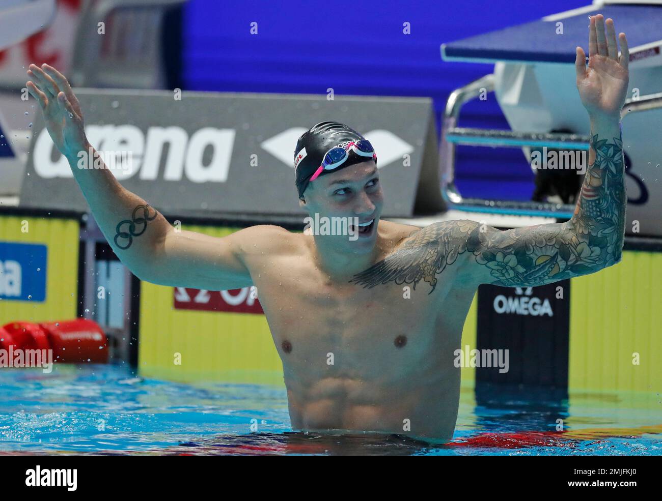 United States' Caeleb Dressel reacts after winning the men's 100m ...