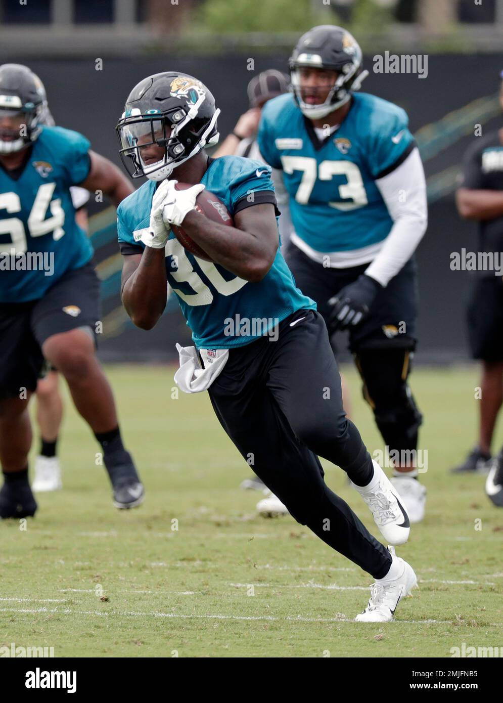 Jacksonville Jaguars running back Ryquell Armstead (23) runs after