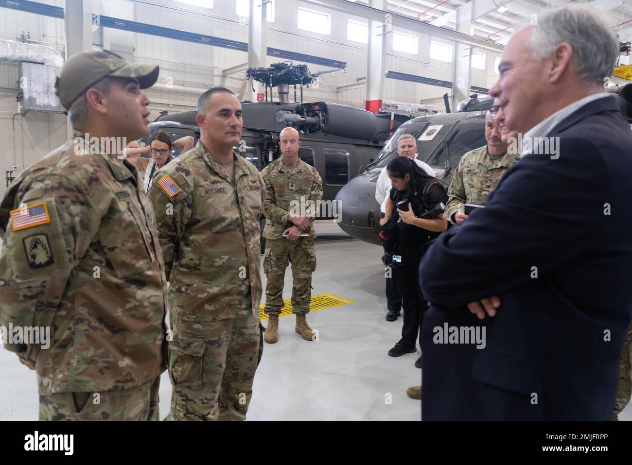 U.S. Senator Timothy Kaine has a conversation with 2d Battalion, 210th Aviation Regiment instructors during a tour of 128th Aviation Brigade August 29, 2022 at Fort Eustis, Virginia. Stock Photo