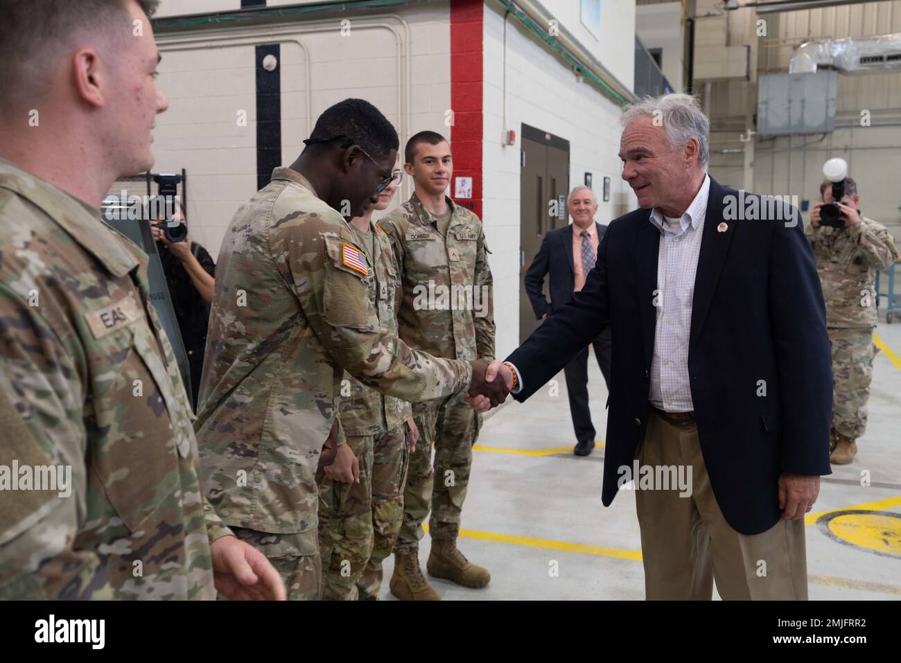 U.S. Senator Timothy Kaine shakes hands with Advanced Individual Trainees during a tour of 128th Aviation Brigade August 29, 2022 at Fort Eustis, Virginia. Stock Photo