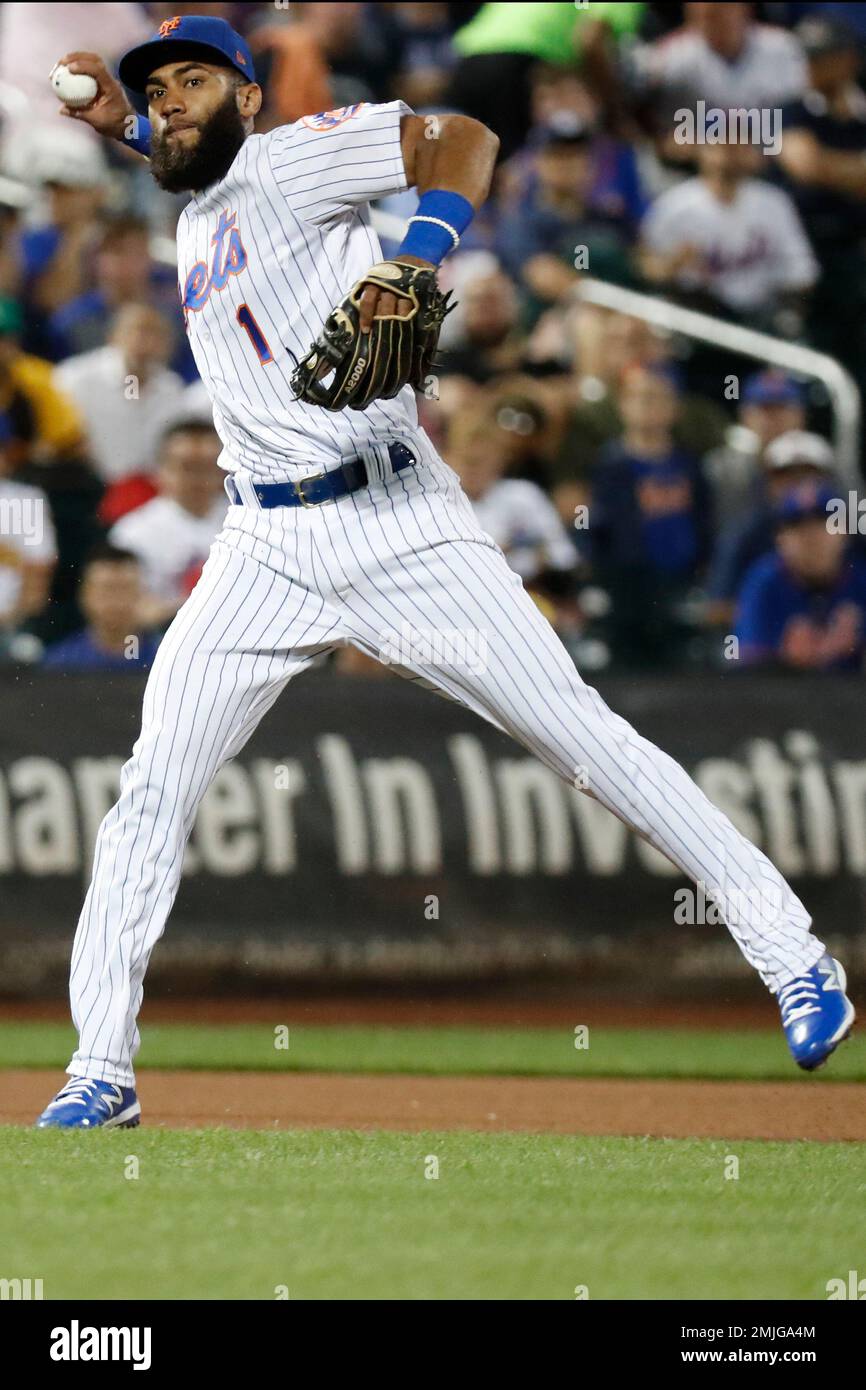 New York Mets shortstop Amed Rosario (1) throws to first during a