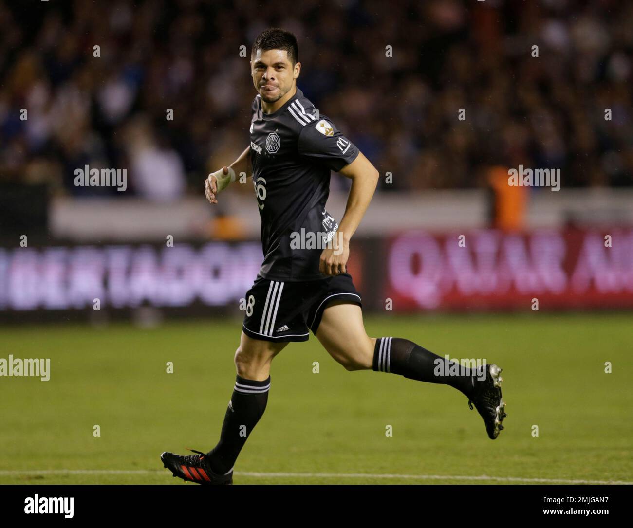 Juan Rojas of Paraguay's Olimpia, left, celebrates after he scored ...