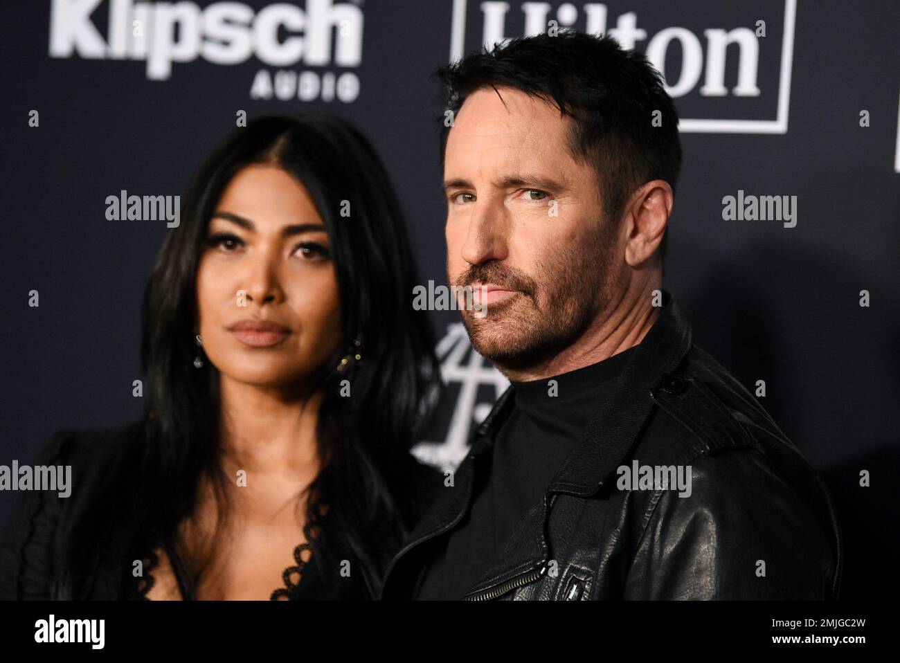 Trent Reznor, right, and wife Mariqueen Maandig attend the 2019 Rock