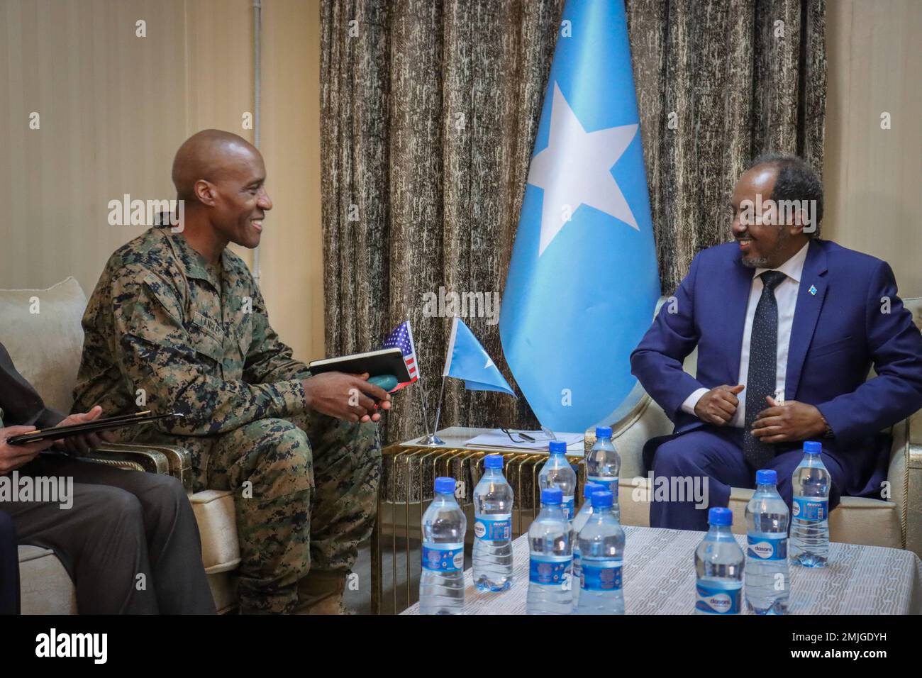 U.S. Marine Corps Gen. Michael Langley, commander, U.S. Africa Command, meets with Somalia President Hassan Sheikh Mohamud in Somalia on Aug. 29, 2022. The visit came as part of a four-day trip to Djibouti, Somalia, and Manda Bay, Kenya, from August 28-31, 2022, to meet with host nation leaders, senior interagency officials, and deployed troops to better understand the political and military situation in East Africa, discuss shared concerns and priorities, and see ongoing operations firsthand. Stock Photo