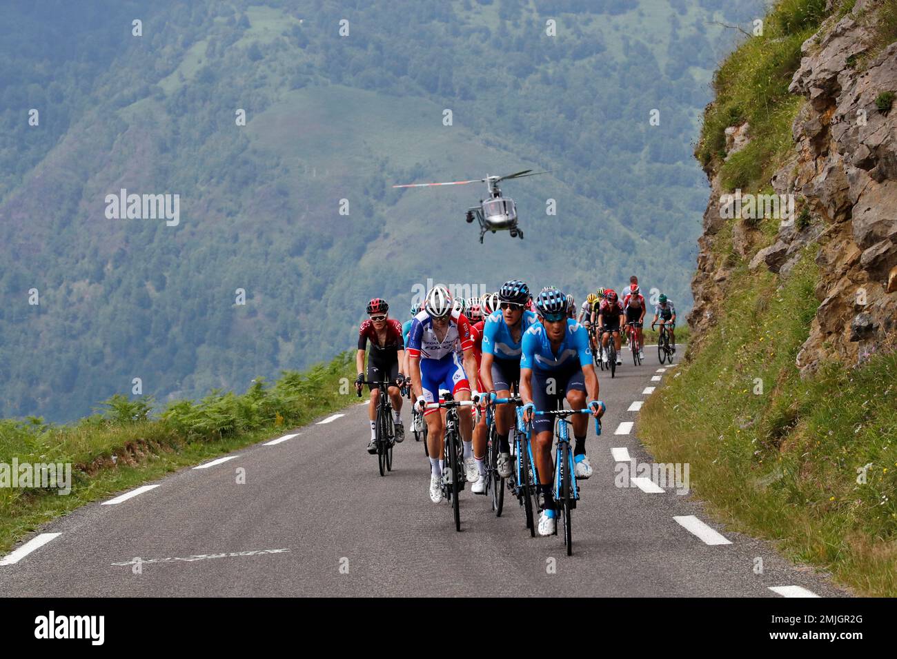 The helicopter with the live TV flies over the pack during the fourteenth stage of the Tour de France cycling race over 117,5 kilometers (73 miles) with start in Tarbes and finish