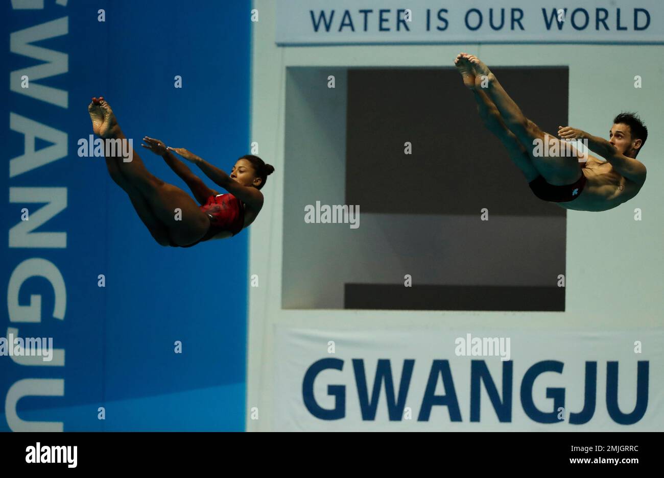 Canada's Francois Imbeaudulac and Jennifer Abel compete in the mixed's