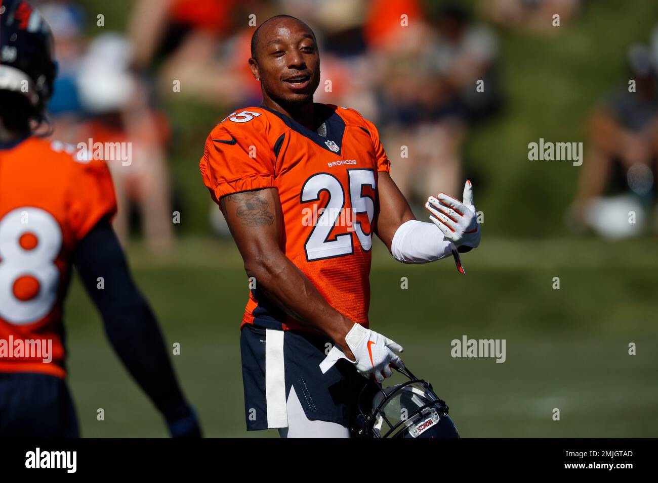 Denver Broncos cornerback Chris Harris (25) takes part in drills during an  NFL football trainin …