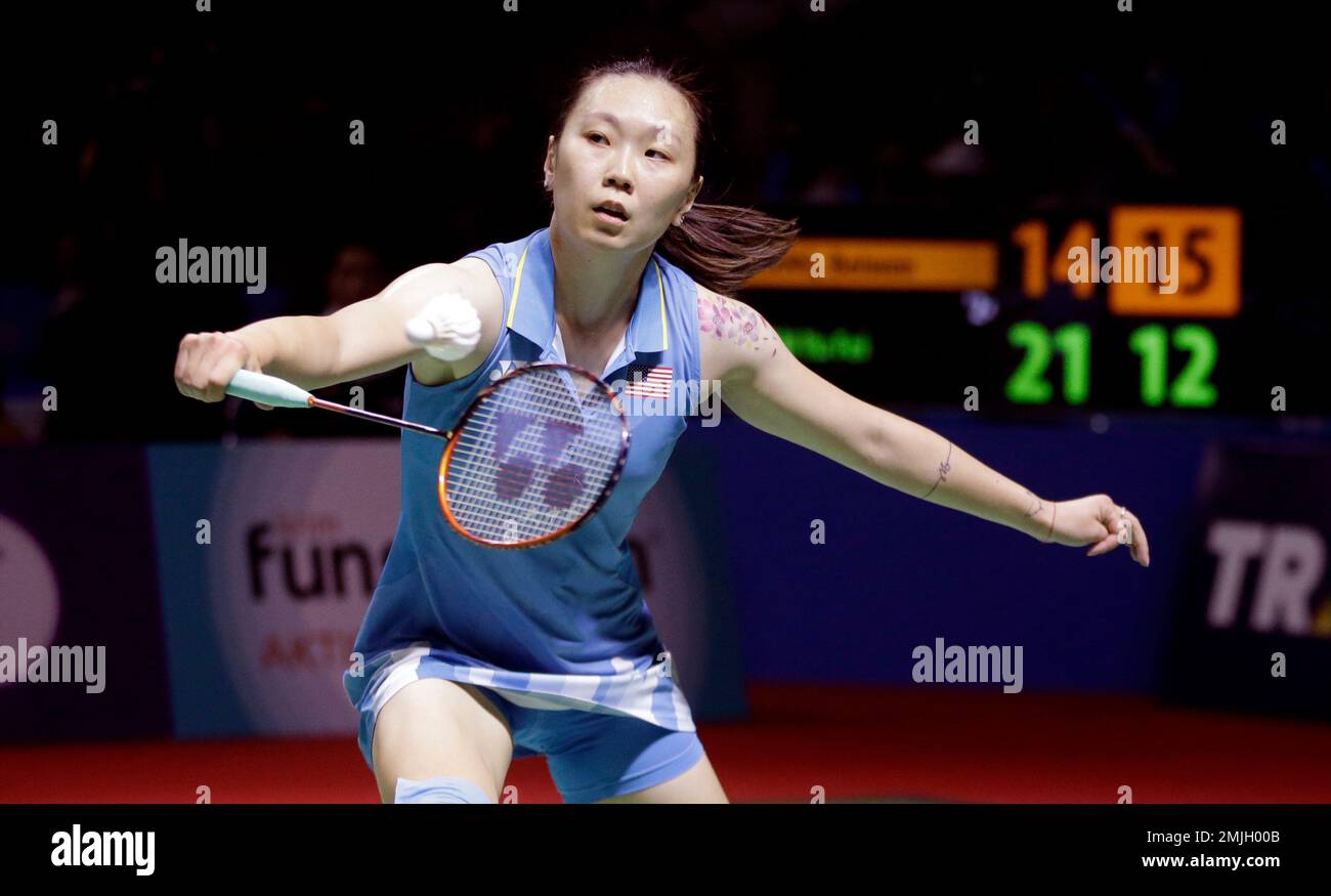 Beiwen Zhang of the United States returns a shot to Chen Yu Fei of China in their womens singles match during the Indonesia Open badminton championship in Jakarta, Indonesia, Friday, July 19,