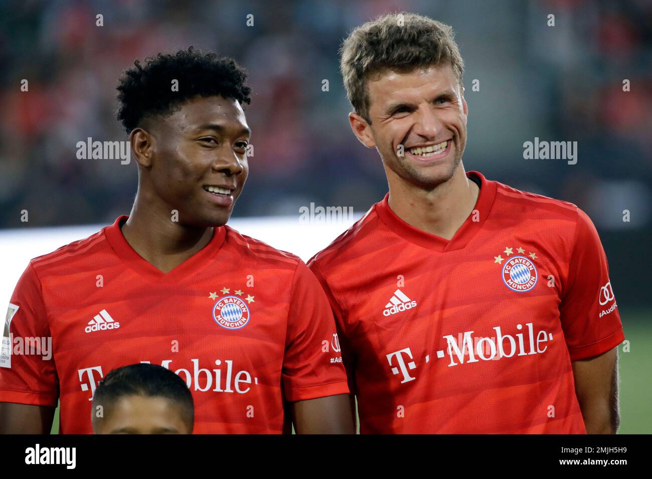 Bayern Munich defender David Alaba, left, smiles next to teammate ...