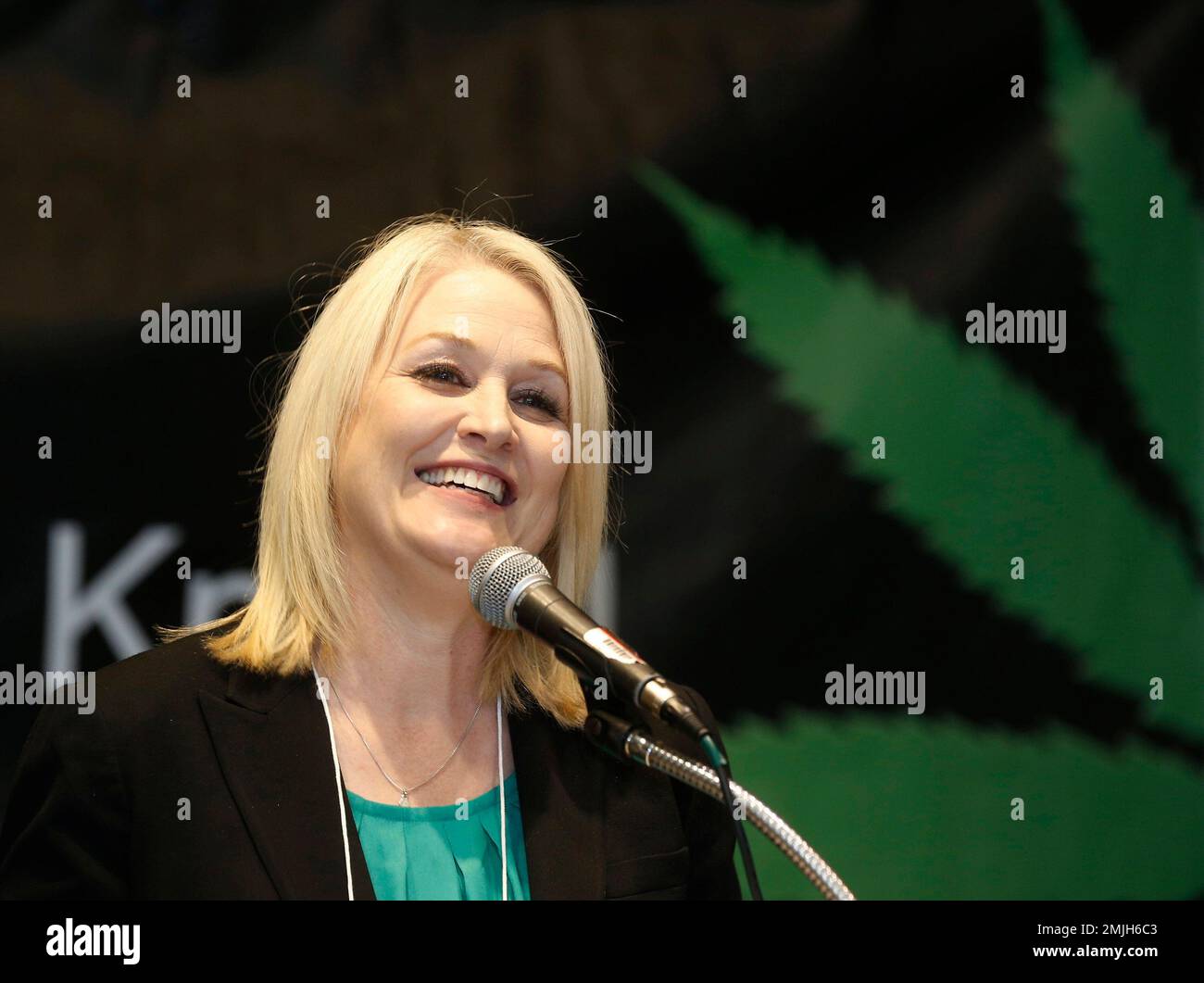 FILE - In this Sept. 28, 2017 file photo California top state pot regulator  Lori Ajax addresses an industry group meeting in Long Beach, Calif.  California auditors have found that the agency