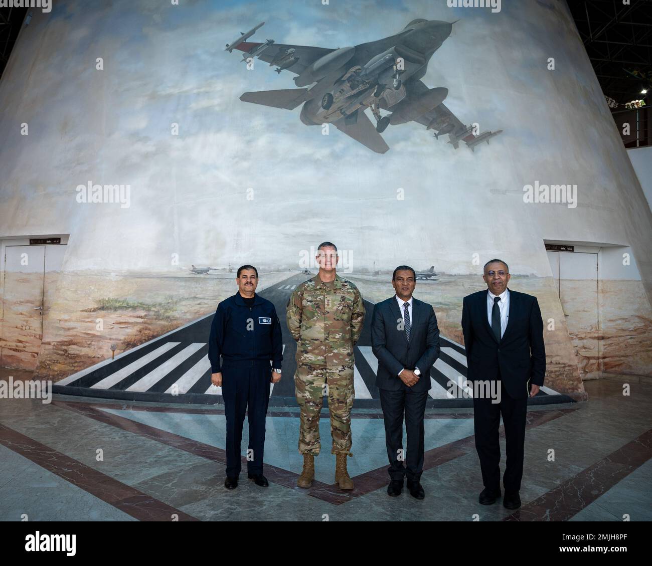 U.S. Air Force Lt. Gen. Alexus G. Grynkewich, Ninth Air Force (Air Forces Central) commander (center-left), poses for a photo with Maj. Gen. Ayman Abbas, Chief, Air Force Training Division (left), Maj. Gen. (Ret.) Magdy Dwaidar, Director, Egyptian Air Force Museum (middle), and Atef Wahba, Cultural Advisor to the Commander, AFCENT, at the Egyptian Air Force Museum in Cairo, Egypt, Aug. 29, 2022. During his visit, Grynkewich experienced the vibrant culture of Egypt while learning about the country’s unique military history. Stock Photo