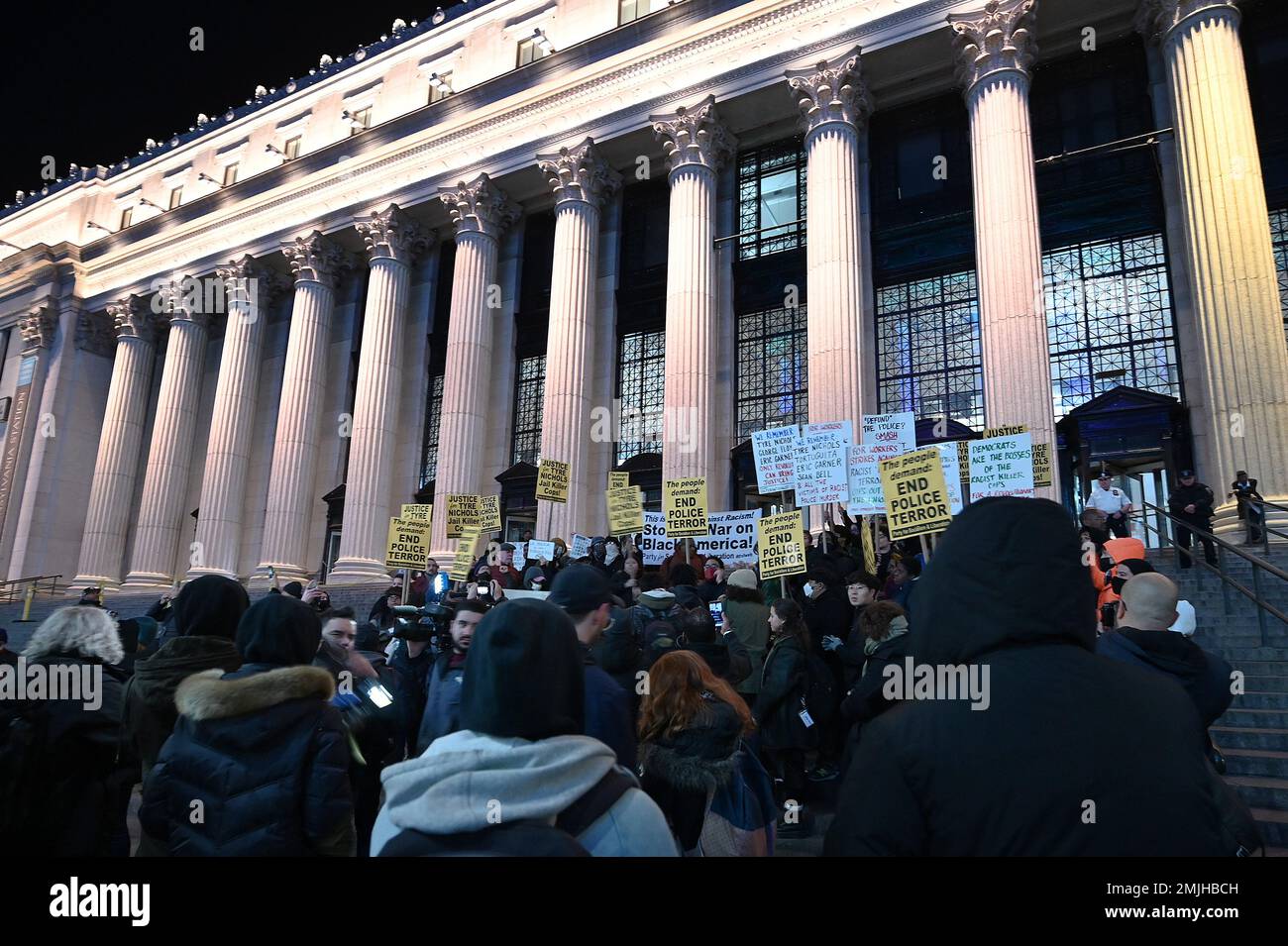New York, USA. 27th Jan, 2023. Demonstrators hold signs as they stand outside the James A Farley Post office along 8th Avenue during protest sparked by the release of the Tyre Nichols fatal beating video, New York, NY, January 27, 2023. The release of a video depicting the fatal beating of Nichols, a 29-year-old African-American man by 5 African-American Memphis Police officers set off protests in NYC and other cities throughout the country. (Photo by Anthony Behar/Sipa USA) Credit: Sipa USA/Alamy Live News Stock Photo