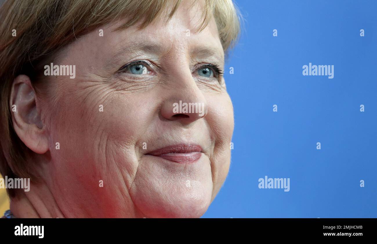 German Chancellor Angela Merkel attends a joint news conference with