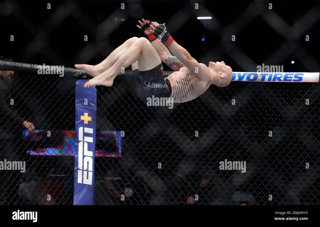 Josh Emmett does a back flip to celebrate after defeating Mirsad Bektic  during a featherweight mixed martial arts bout at UFC Fight Night in  Sacramento, Calif., Saturday, July 13, 2019. Emmett won
