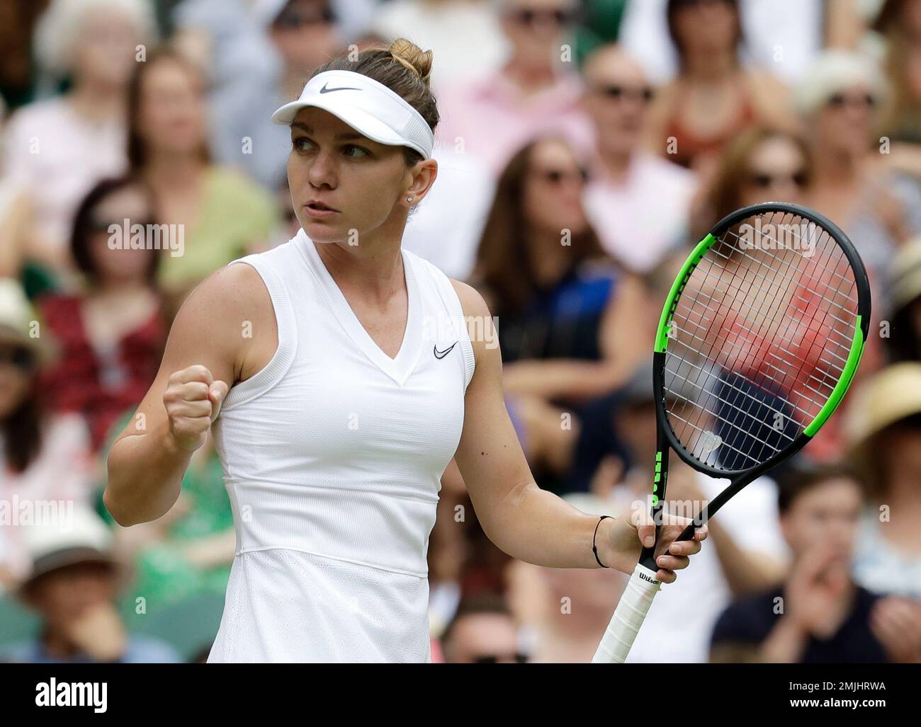 Romanias Simona Halep celebrates after winning a point against United States Serena Williams during the womens singles final match on day twelve of the Wimbledon Tennis Championships in London, Saturday, July 13,