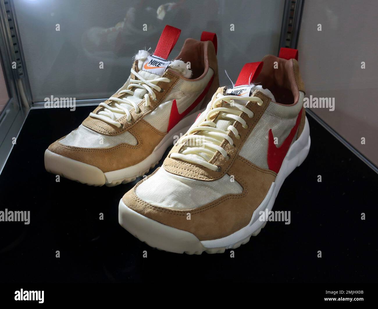A pair of 2012 "Tom Sachs X Nikecraft Mars Yard" shoes are on display at  Sotheby's auction house in New York on July 12, 2019. Sotheby's expects two  pairs of the shoes