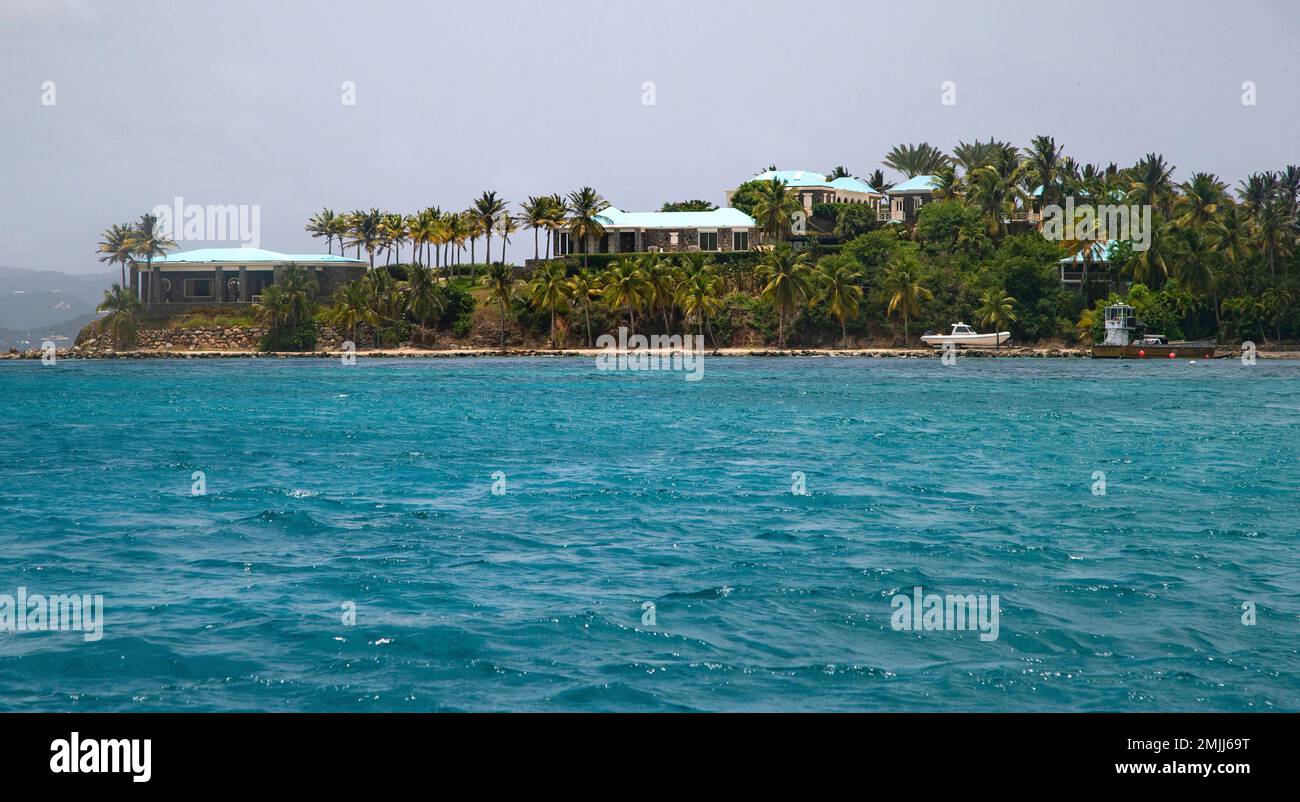 https://c8.alamy.com/comp/2MJJ69T/this-tuesday-july-9-2019-photo-shows-a-view-of-little-saint-james-island-in-the-u-s-virgin-islands-locals-recalled-seeing-jeffery-epsteins-black-helicopter-flying-back-and-forth-from-the-international-airport-in-st-thomas-to-his-helipad-on-little-st-james-island-where-he-built-a-cream-colored-mansion-with-a-bright-turquoise-roof-surrounded-by-several-other-structures-including-the-maids-quarters-and-a-massive-square-shaped-white-building-on-one-end-of-the-island-that-some-say-is-a-music-room-fitted-with-acoustic-walls-ap-photogianfranco-gaglione-2MJJ69T.jpg